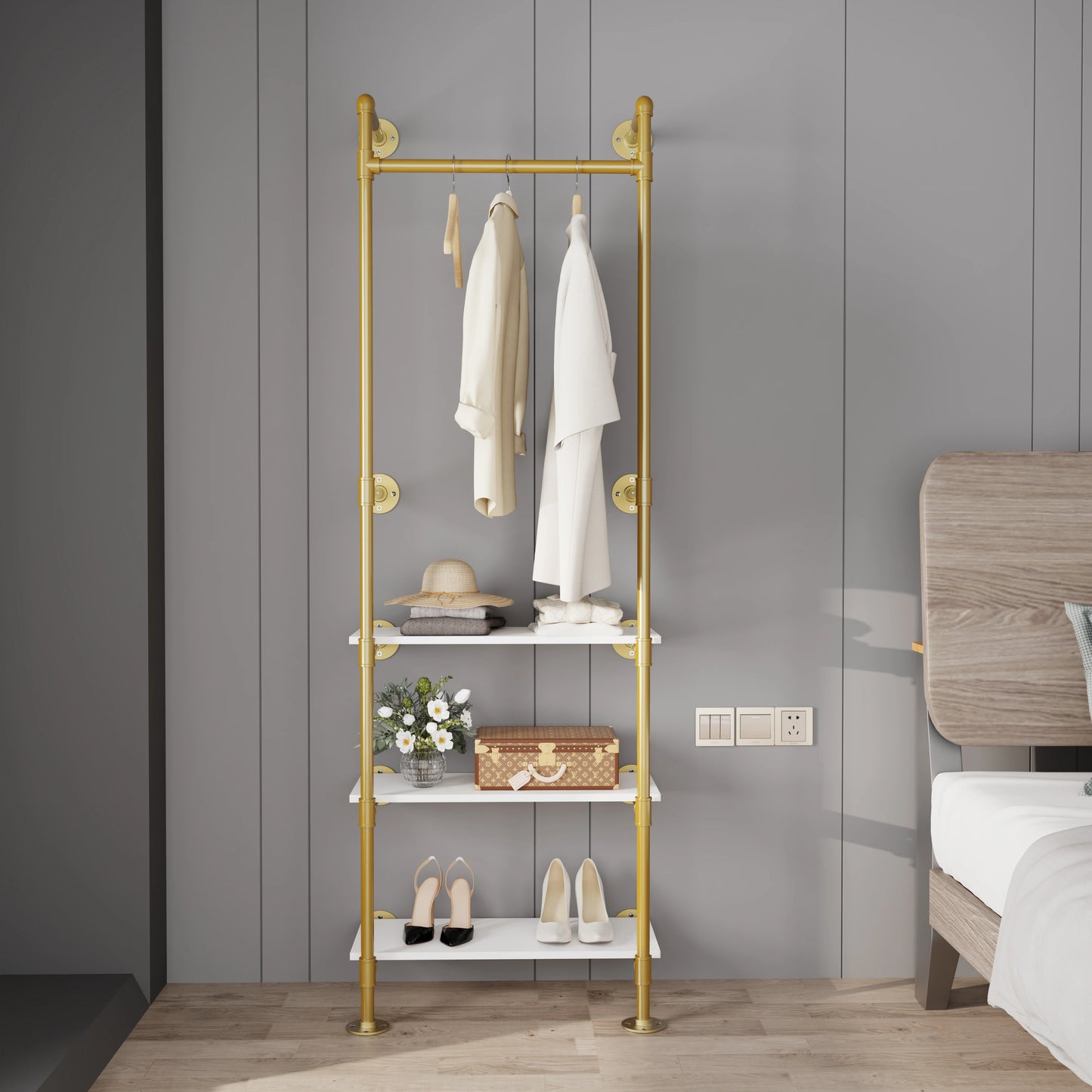 Gold Industrial Pipe Clothes Rack on Wall